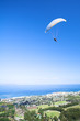 paraglider ridge soaring next to the mountain