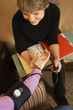 middle-aged nurse taking blood pressure