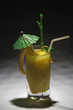 Photo: yellow drink with green umbrella yellow drink with green umbrella