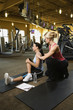 adult female with personal trainer.