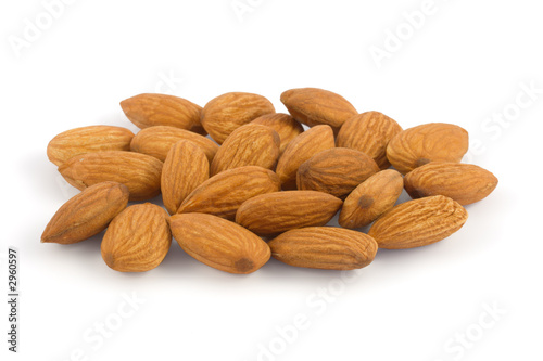 Photo: pile of almonds isolated on white background pile of almonds isolated on white background