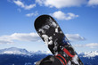 Foto: Snowboard and mountain. Snowboard and mountain.