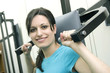 young woman goes in for sport in the gym