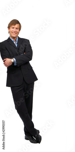 businessman leaning on something.