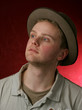 man in grey hat