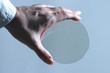 translicent microchip plate in womans hand