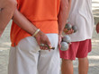 players of game of bowls from behind with cigar in a hand, saint