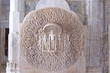 stelle of marble of a jain temple with detailed scuplture, ranak