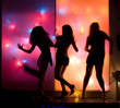 dancing girls silhouettes at colorful disco lights dancing girls silhouettes at colorful disco lights