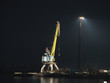 port crane on the bank of the dnieper night, ukrai