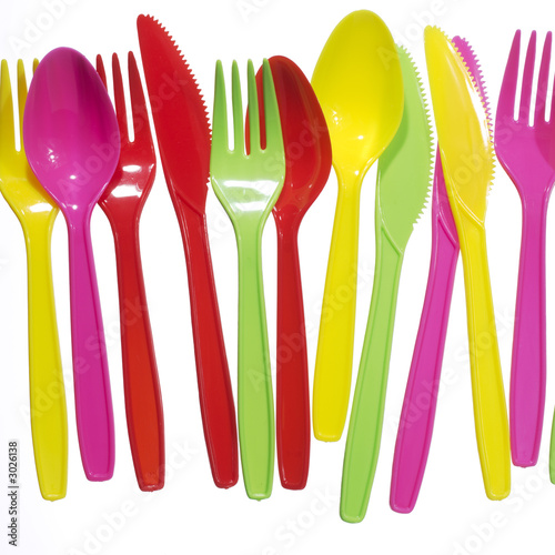 Photo: vibrant multicolored forks, kives and spoons vibrant multicolored forks, kives and spoons