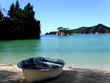 a boat and a blue sea