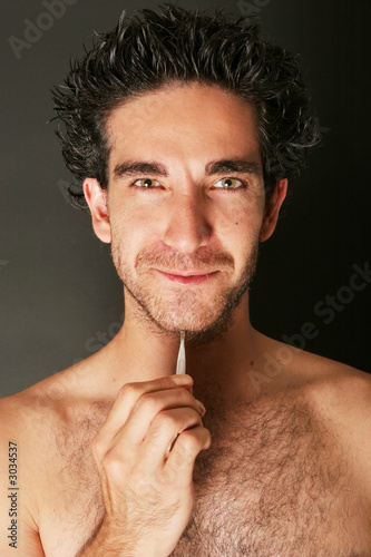 Photo: man with tweezers man with tweezers