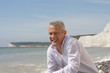 laughing man on beach