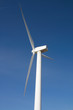 windmill on blue sky from the side
