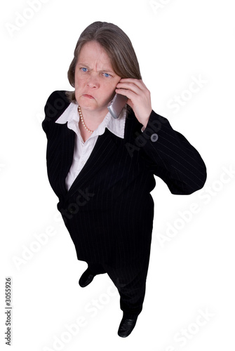 Photo: businesswoman making a cell phone call businesswoman making a cell phone call