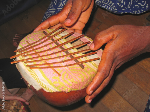 african musical instrument with the musician hands, cameroon, af african musical instrument with the musician hands, cameroon, af