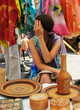 the girl and carved products from a bark of a birch