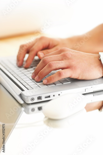 nice laptop on a glass table.