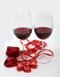 two goblets with red wine