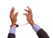 hands cuffed and reaching up hands cuffed and reaching up