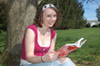 reading under tree