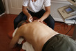 physiotherapist using ultrasound on shoulder