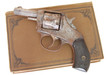 antique gun and book