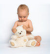 cute infant with teddy bear