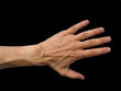 main gauche d'homme sur fond noir