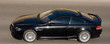 silver wheels, black sportscar isolated background