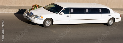 Photo: car wedding limousine flowers ride newlyweds car wedding limousine flowers ride newlyweds