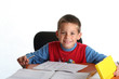 young boy doing homework