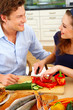 young couple in their kitchen
