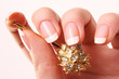 french manicuere and a hair-pin