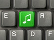 computer keyboard with music key
