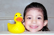 child bath time portrait with rubber duck