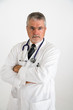 Foto: doctor with arms folded looking angry doctor with arms folded looking angry