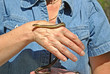 garter snake crawling on hand
