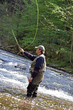 fisher in river