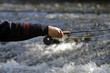fisher in river