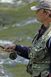 fisher in river