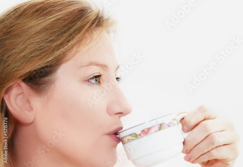 Photo: woman drinking woman drinking