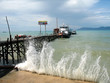 waves hitting jetty