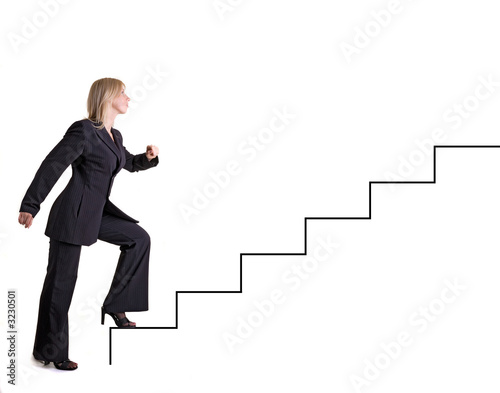 Photo: businesswoman goes upstairs businesswoman goes upstairs