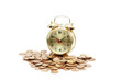 "time is money" concept with clock and coins