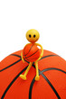 ����: smilie sitting on basketball isolated on white � Elnur #3231195