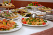 some appetizing food on banquet table some appetizing food on banquet table