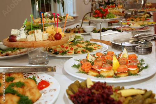 Photo: some appetizing food at banquet table some appetizing food at banquet table