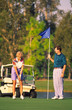 couple golfing